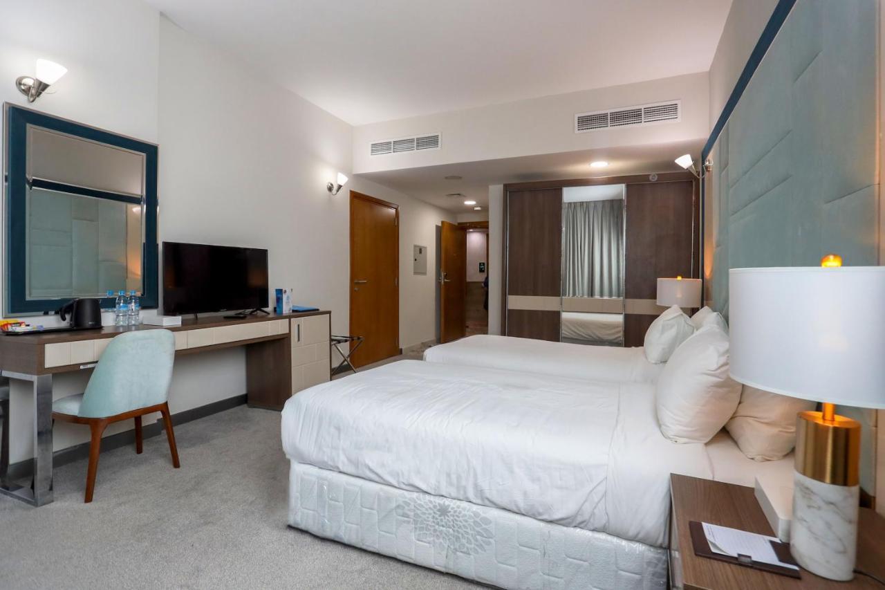 Al Azmy 116 Hotel Sharjah Exterior photo